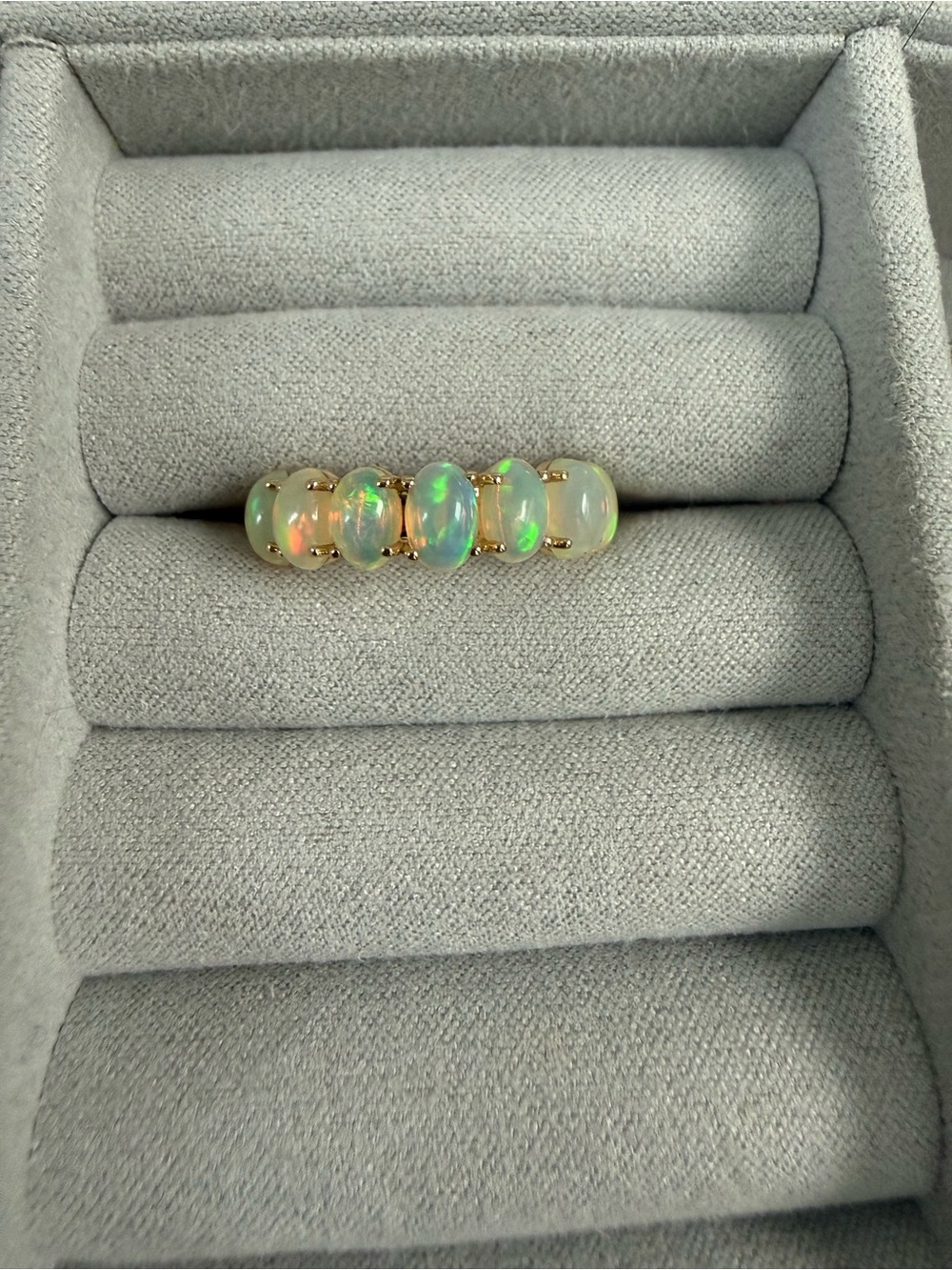 Beautiful fire opal 14k yg eternity band, size 6